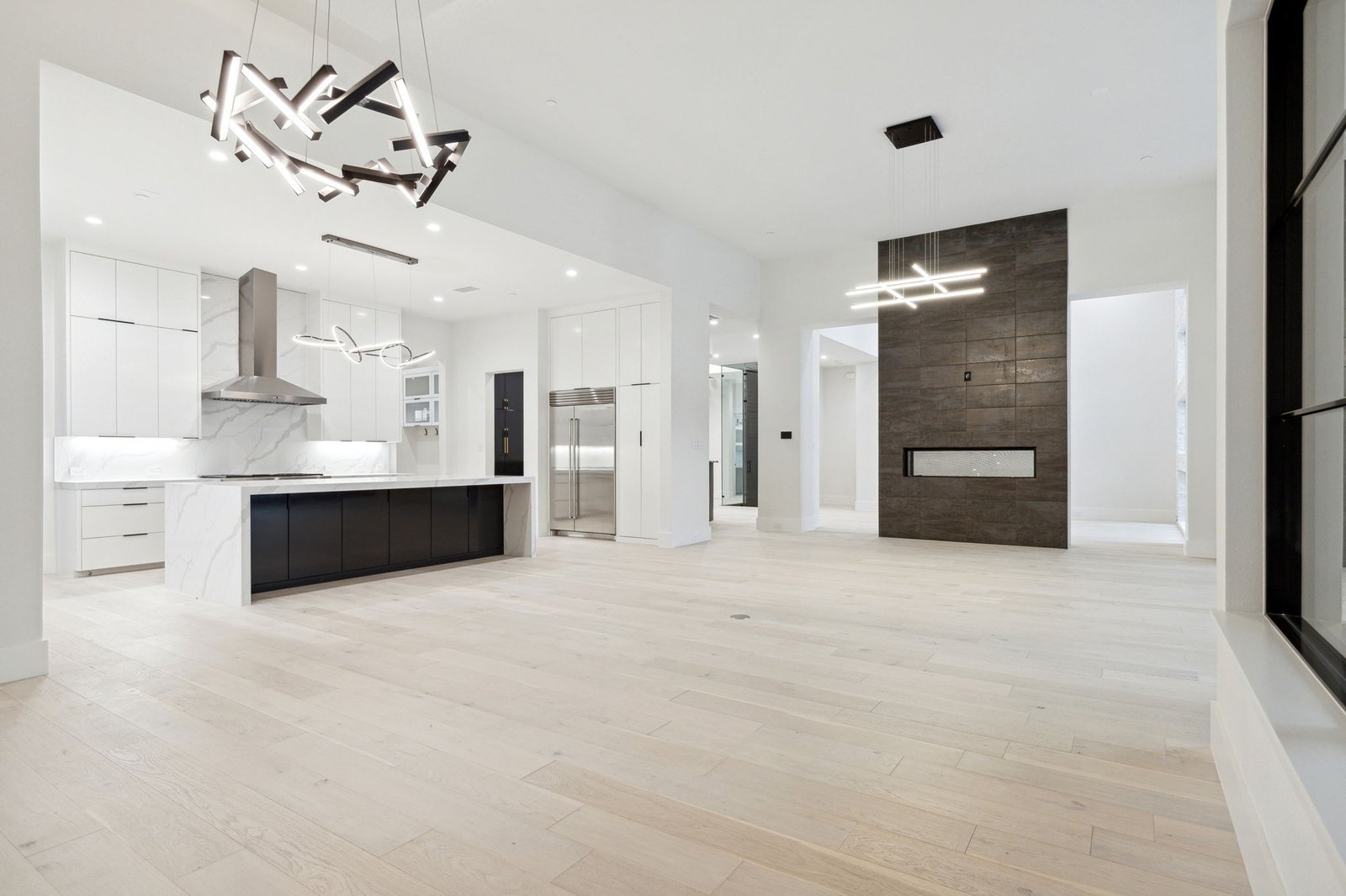 Open-concept kitchen and living area at Chambord Custom Home I