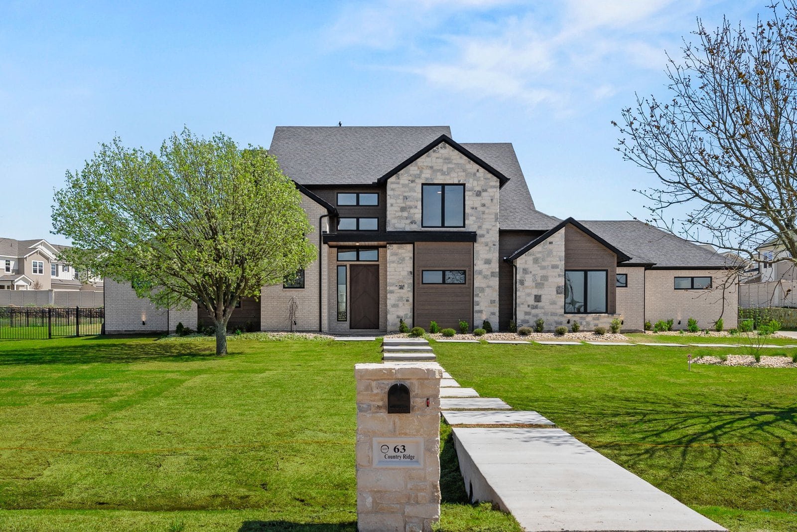 Exterior view of a Gutman custom home in Country Ridge, Melissa, Texas