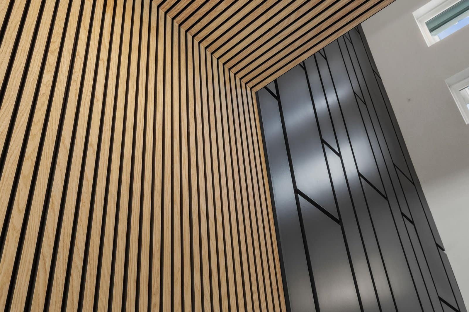 Vertical wood-slat architectural detail in a Melissa custom home