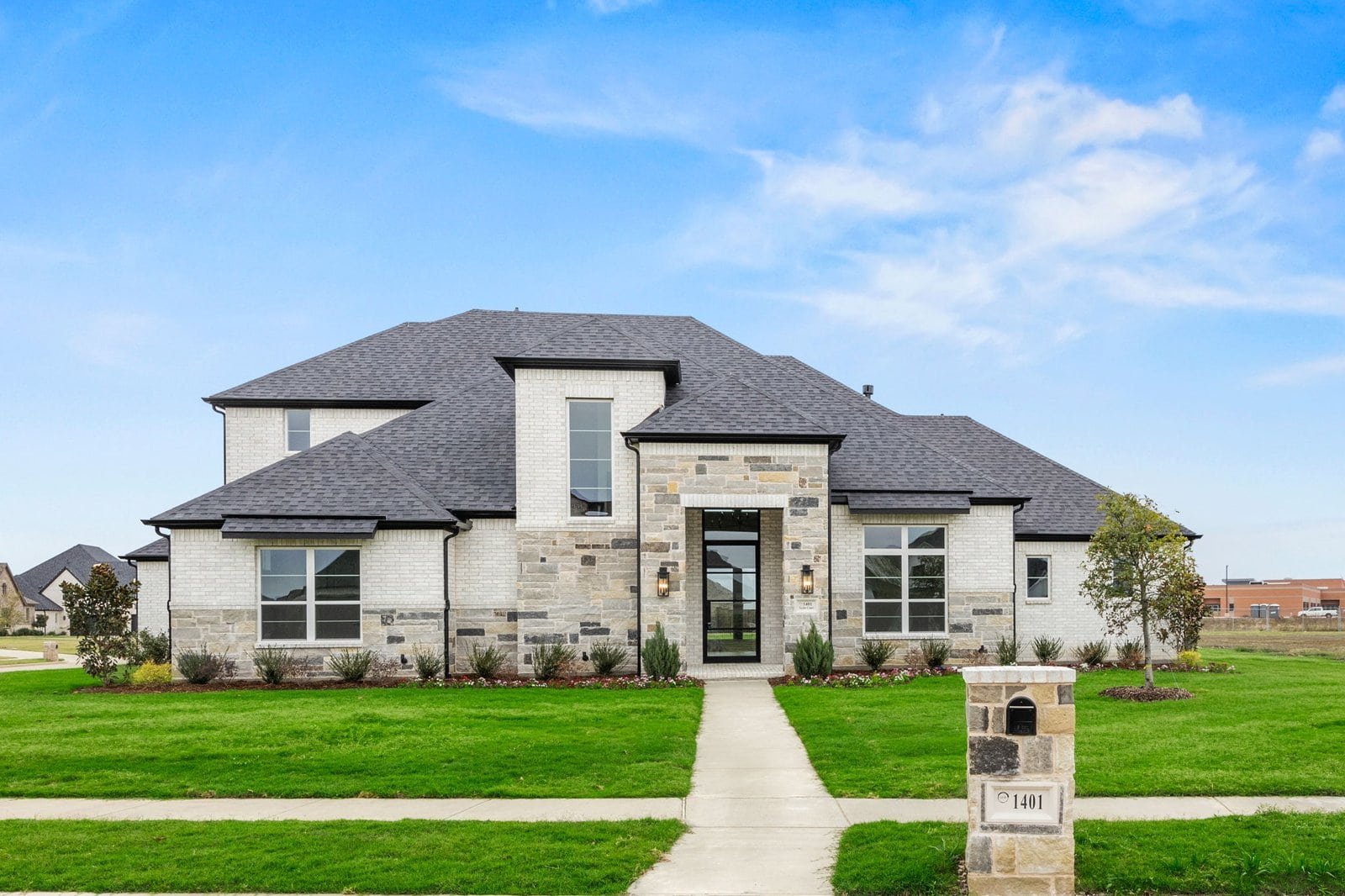 Front exterior of a Gutman custom home in Gunter, Texas