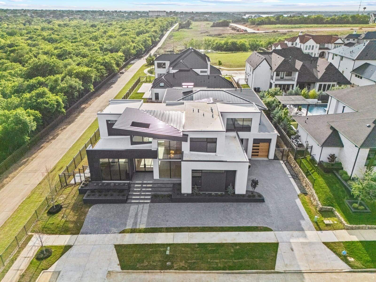 Pool and backyard at the completed Tuscan Oaks custom home in Frisco